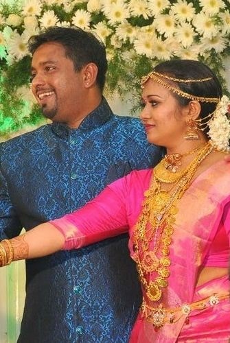 Saranya Sasi y Binu Xavier en su d&iacute;a de recepci&oacute;n