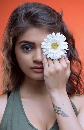 Tatuaje de Ishwari Deshpande en el antebrazo izquierdo