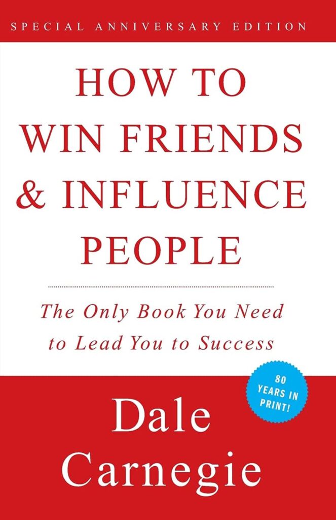 Su guía de los 10 mejores libros de negocios de todos los tiempos Portada del libro Cómo ganar amigos e influir en las personas de Dale Carnegie con el título en texto rojo.